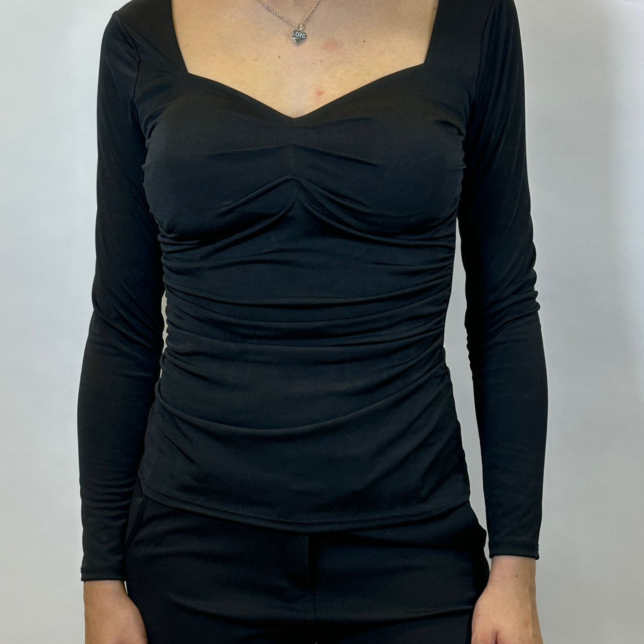 Top con Scrollo a Cuore