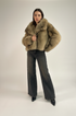 Beige fur jacket with new model pose